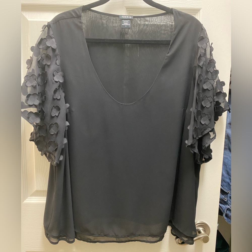 Torrid Blouse in black with flower detail on sleeves